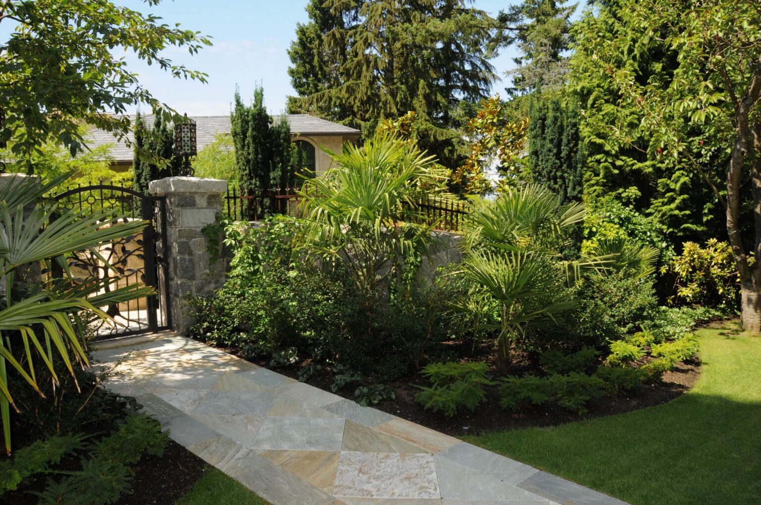High end landscape construction by Fossil Landscape Construction in Vancouver BC featuring refined outdoor spaces, detailed craftsmanship and timeless design.